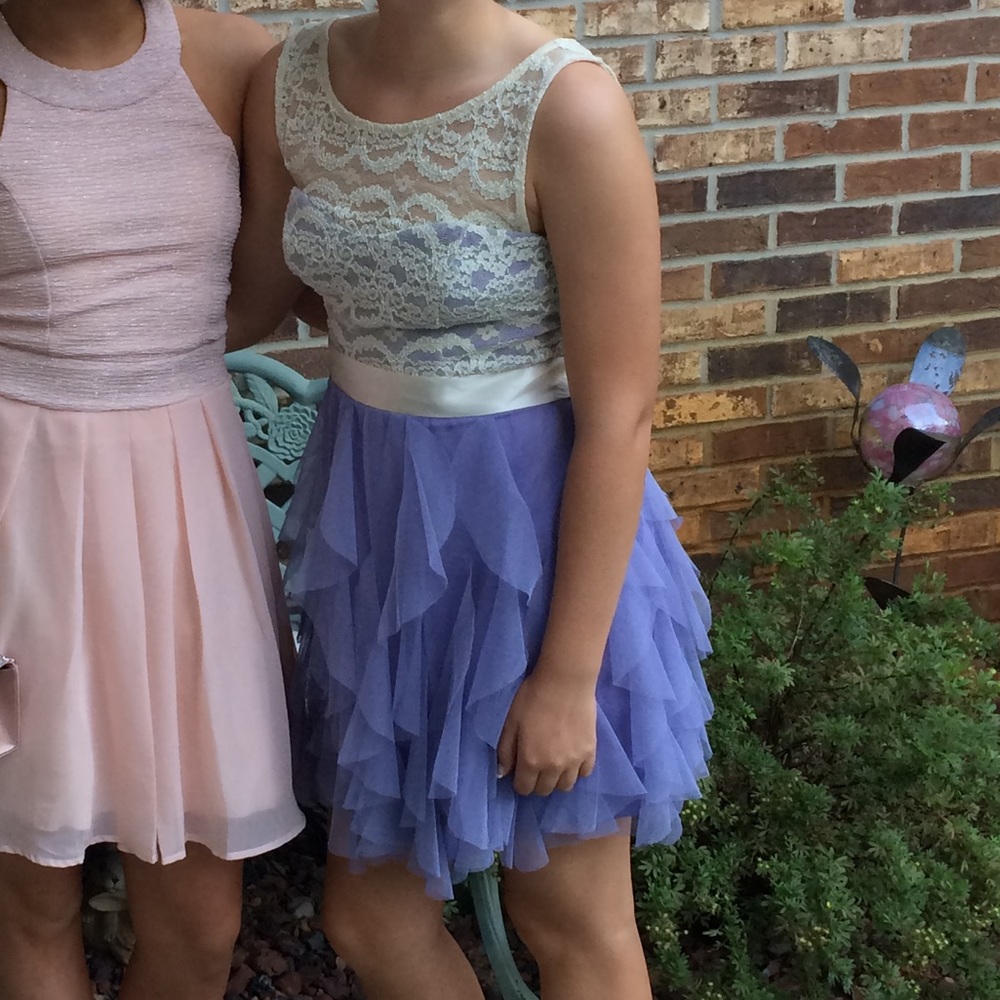 purple dress with a cream lace top